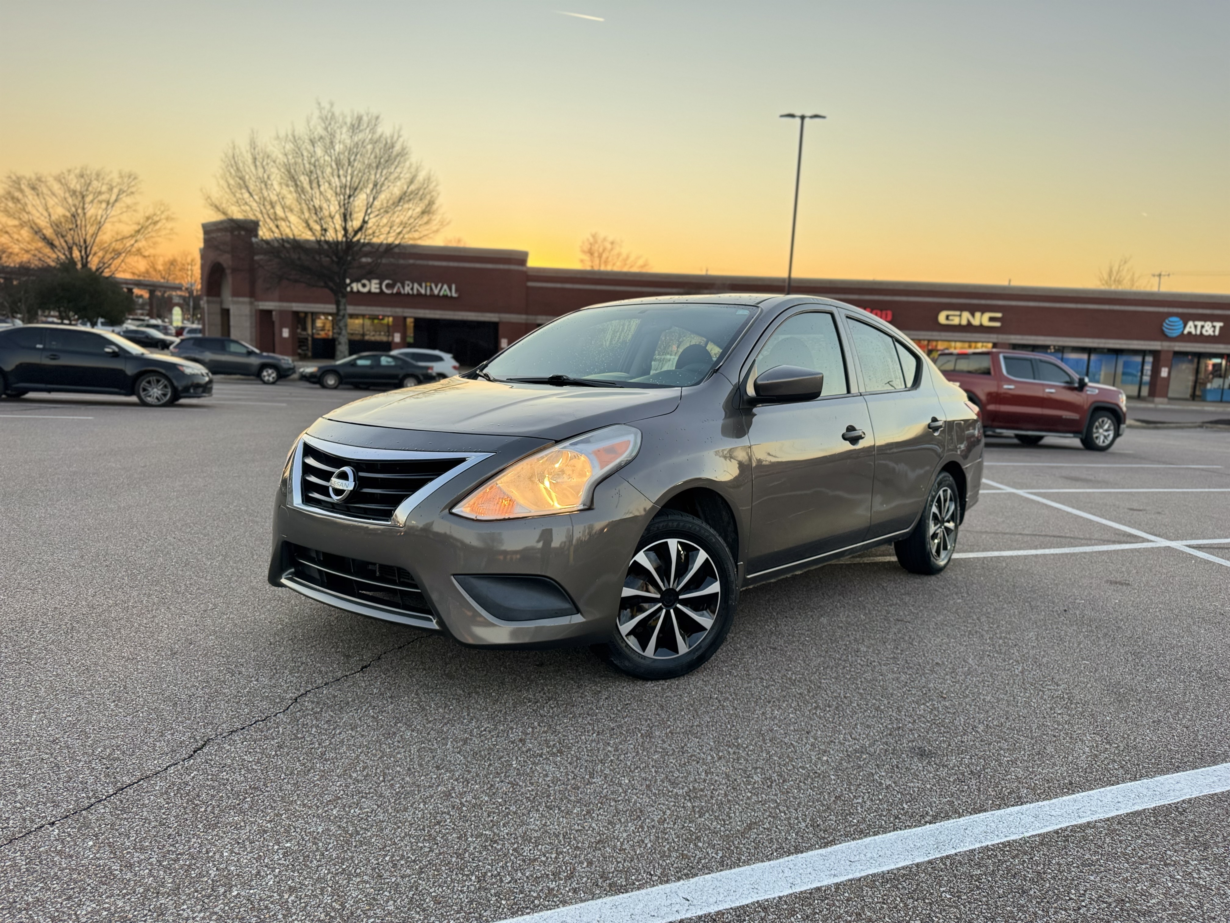 2016 Brown 2016 Nissan Versa S Plus — sold rent-to-own