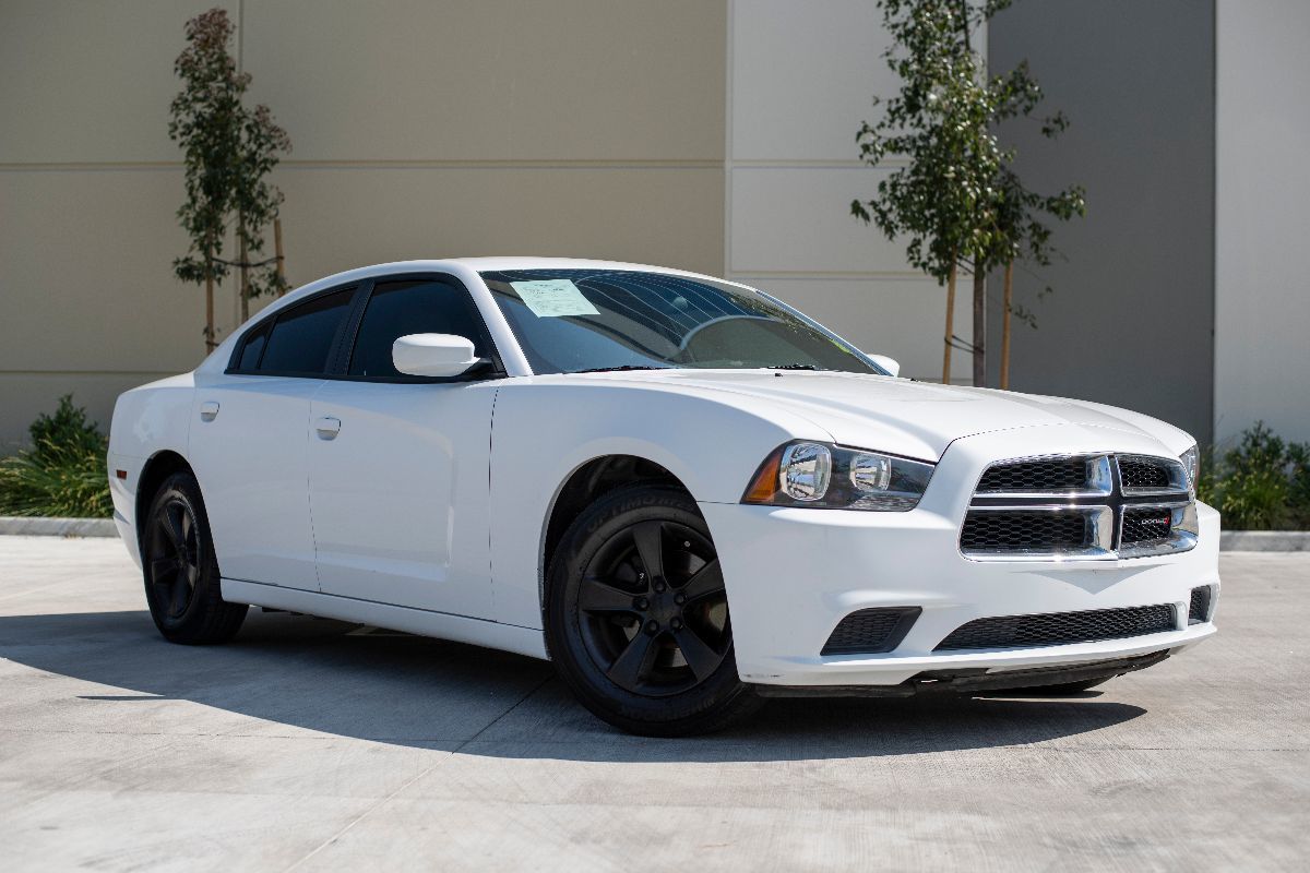 White 2014 Dodge Charger V6 Police Interceptor (Former Fleet Memphis Police Department MPD) available for week-by-week lease at NextDrive