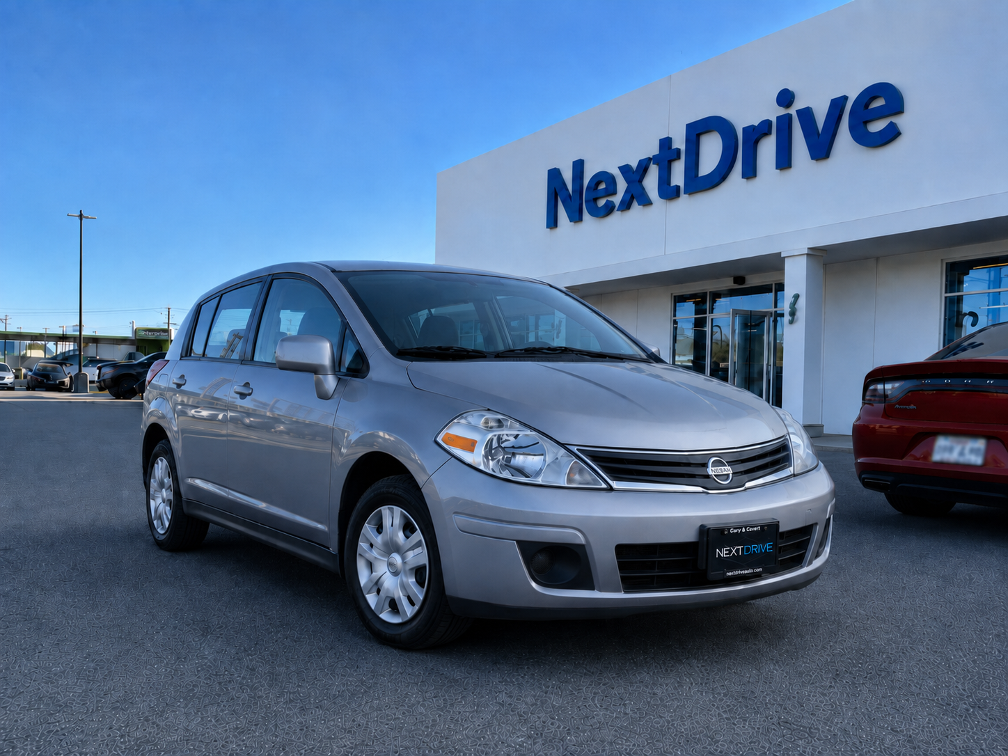 2012 Gray 2012 Nissan Versa — currently leased on contract