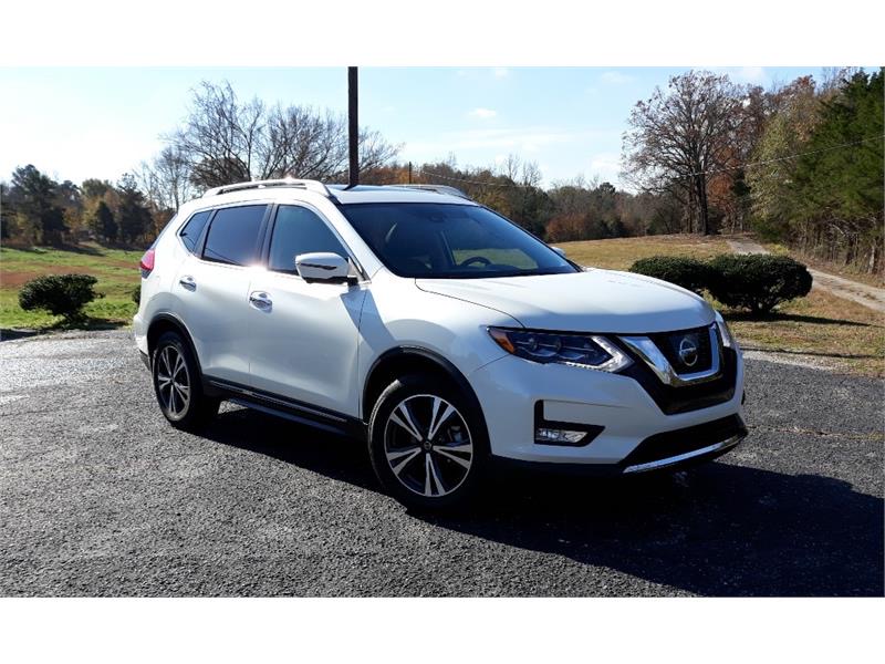 White 2017 Nissan Rogue SV available for week-by-week lease at NextDrive